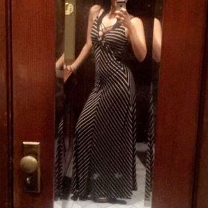 Striped maxi dress. Fitting top Lose bottom